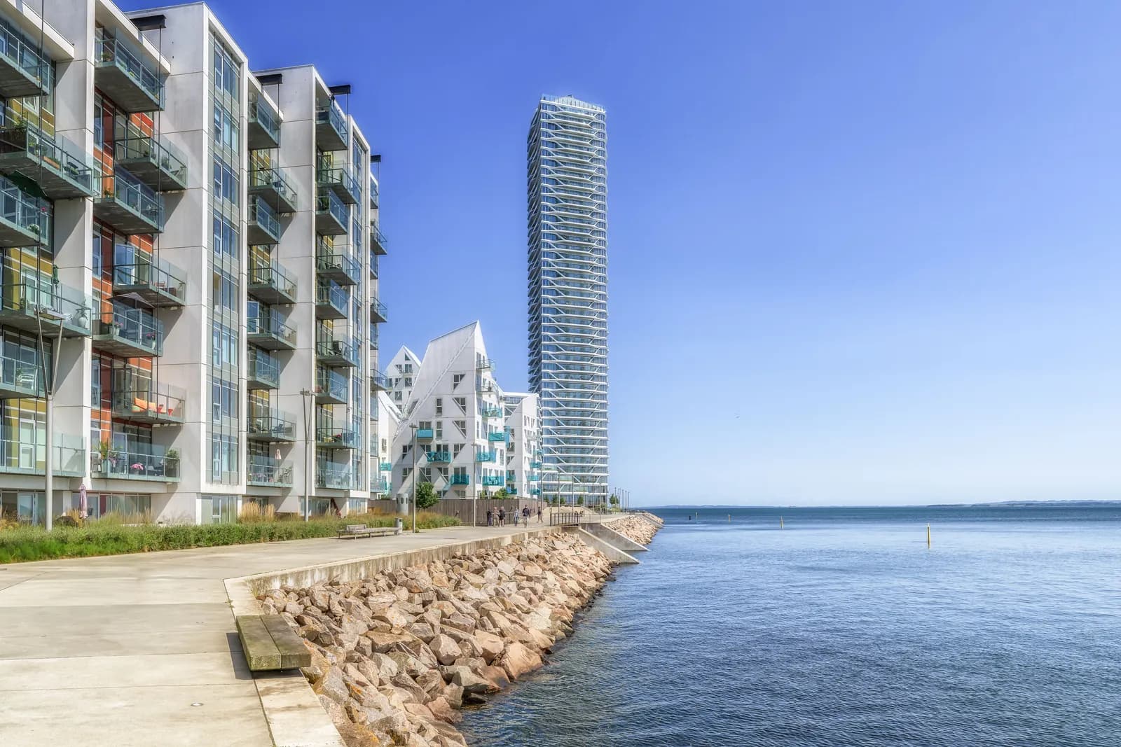 Contemporary waterfront apartment towers seen from across the water
