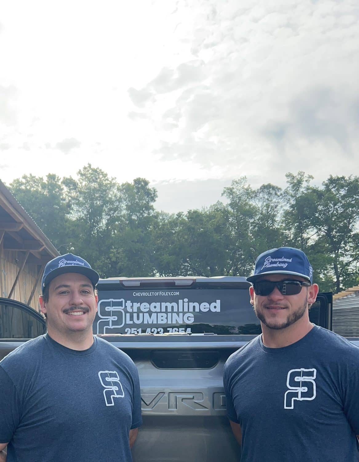 Streamlined Plumbing crew and truck ready for a Baldwin County property call
